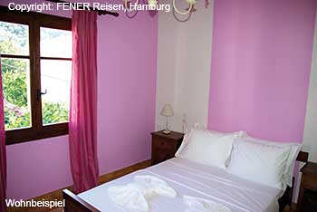 Schlafzimmer eines Appartements im Iro im Pilion